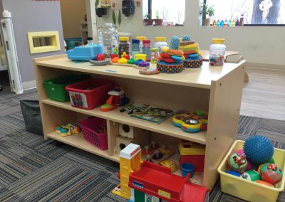 Yellow infant room exploration station